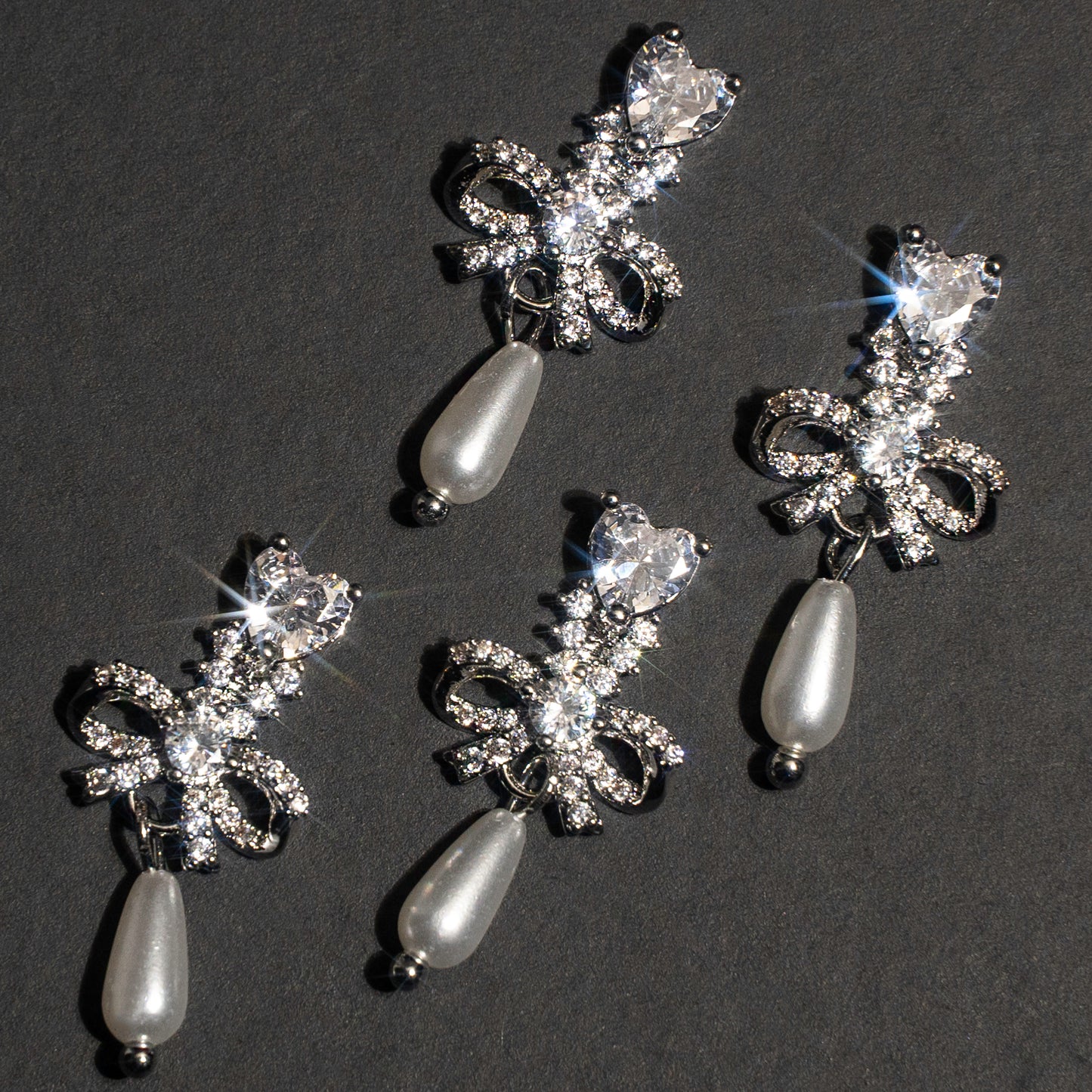 Bow and Heart Dangle Silver