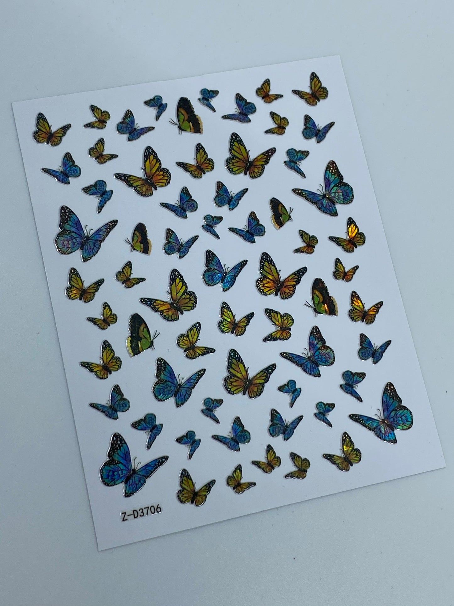Pegatina holográfica de mariposa azul/amarilla