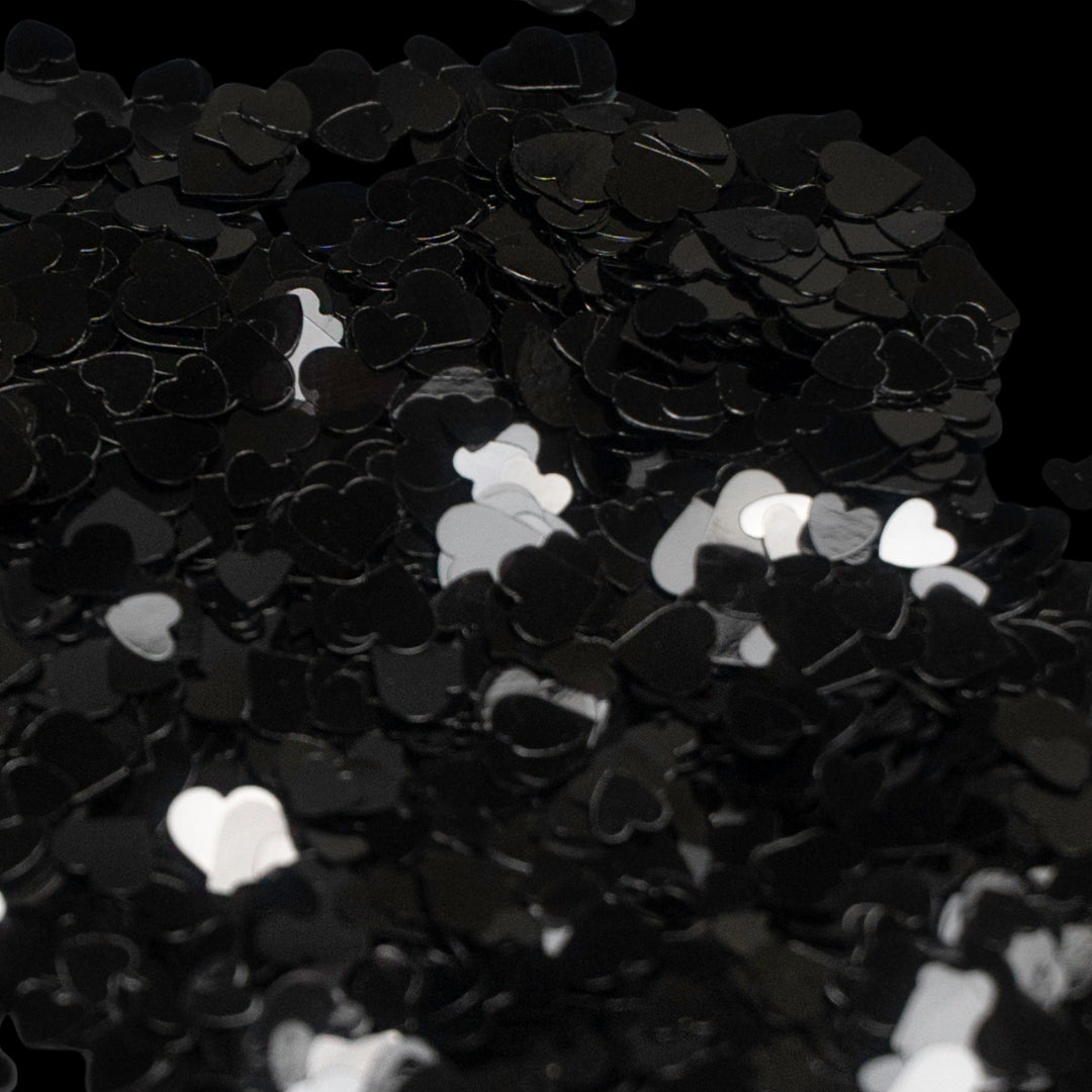 Corazones holográficos negros