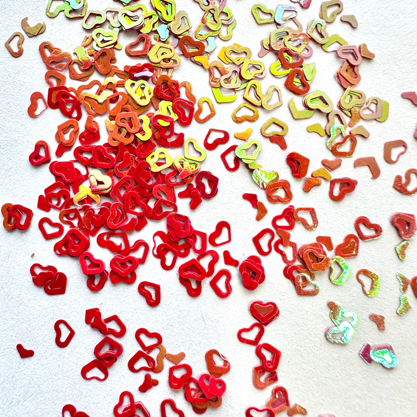 Corazón holográfico con purpurina roja y rosa