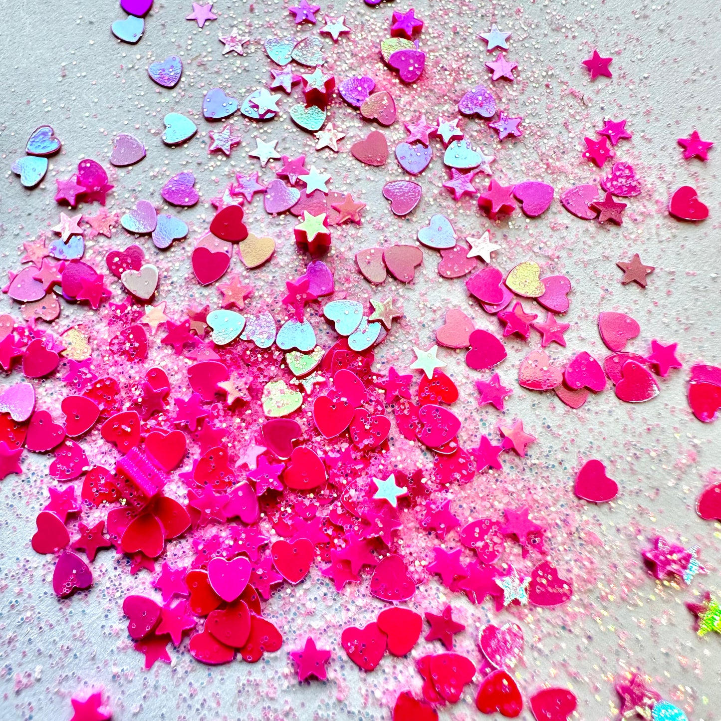 Estrellas y corazones rosas con purpurina